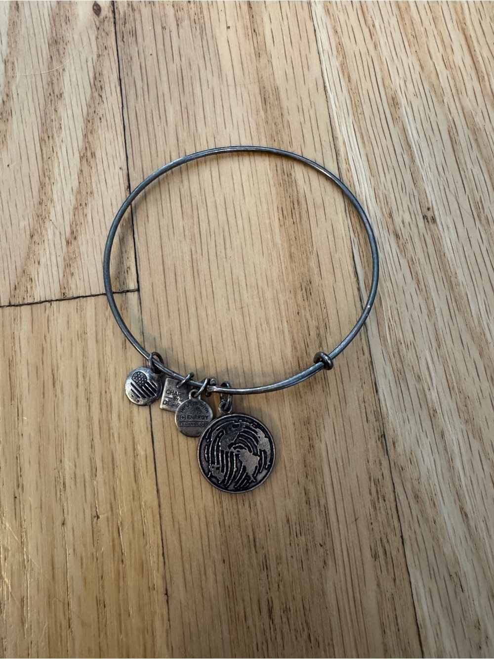Alex & Ani World Bracelet, silver bangle style. Some tarnishing.